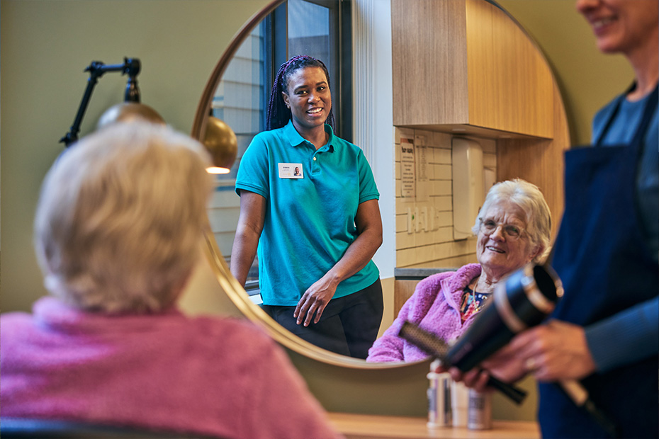 A woman getting her hair styled by a professional in the Dalkeith Garden's salon.