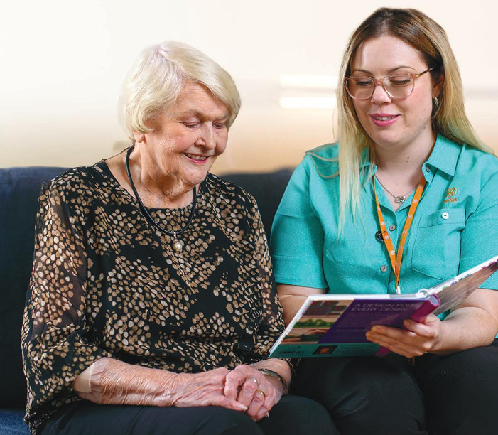 Benetas staff member with resident 