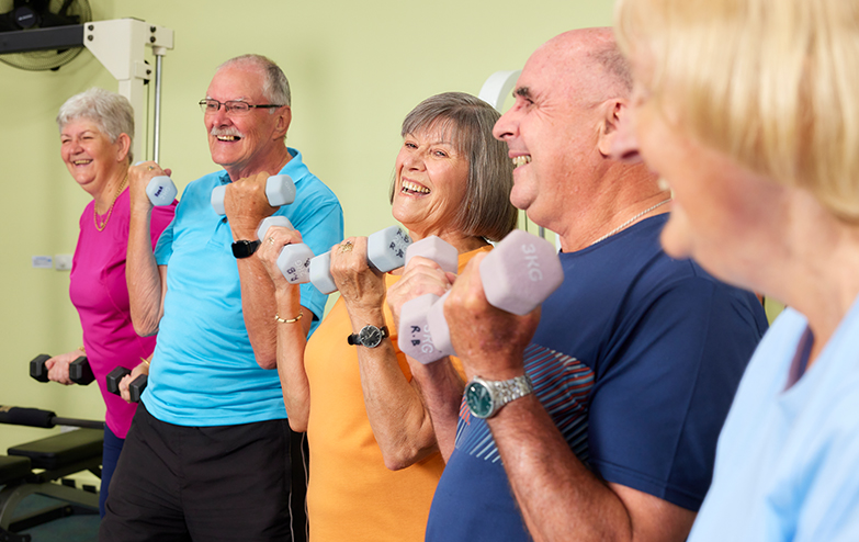 Older adults working out in a gym setting